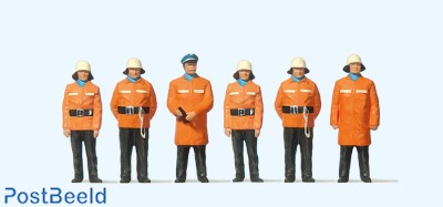 Fire fighters in protective jackets