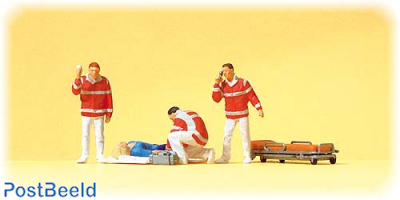 Paramedic team, injured persons on blanket