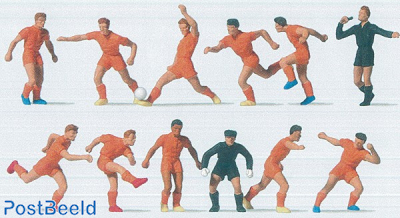 Footbalteam with a orange uniform including a referee